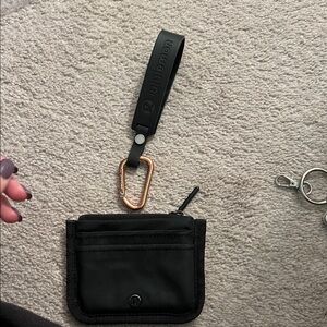 lululemon athletica Black Pouch with Gold Clip